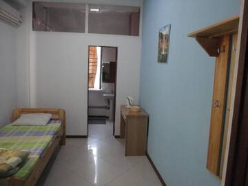 Фото номера Одноместный номер с собственной ванной комнатой Хостелы Amigo Hostel Almaty г. Алматы 2