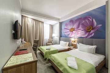 Фото номера Двухместный номер с 2 отдельными кроватями Отель Renion Hills Hotel г. Алматы 5