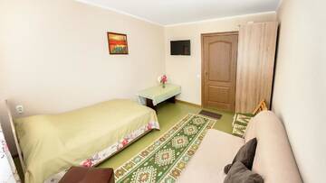 Фото номера Апартаменты с 3 спальнями Апартаменты Apartment Utegen Batyr 2 г. Алматы 9
