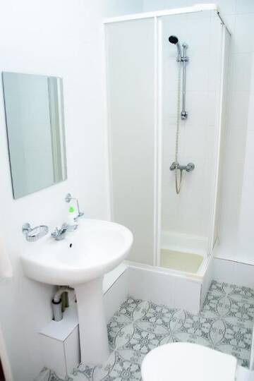 Фото номера Дом с 4 спальнями Дома для отпуска Shymbulak Resort House г. Алматы 46