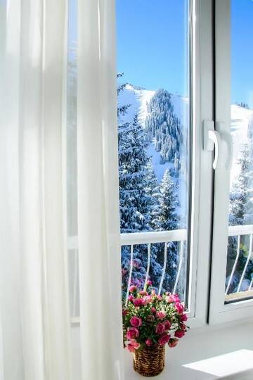 Фото номера Дом с 4 спальнями Дома для отпуска Shymbulak Resort House г. Алматы 49