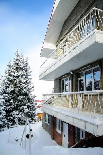 Фото номера Дом с 4 спальнями Дома для отпуска Shymbulak Resort House г. Алматы 44