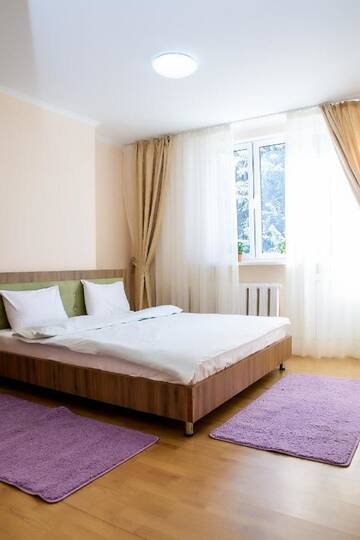 Фото номера Дом с 4 спальнями Дома для отпуска Shymbulak Resort House г. Алматы 15