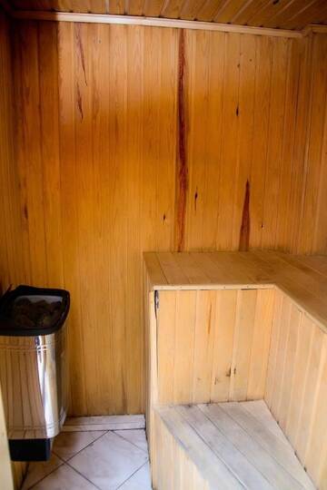 Фото номера Дом с 4 спальнями Дома для отпуска Shymbulak Resort House г. Алматы 27