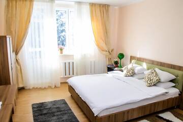Фото номера Дом с 4 спальнями Дома для отпуска Shymbulak Resort House г. Алматы 40