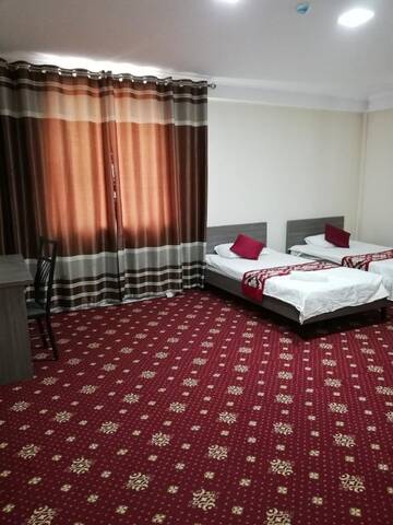 Фото номера Двухместный номер с 2 отдельными кроватями Отель DDHotel г. Алматы 2