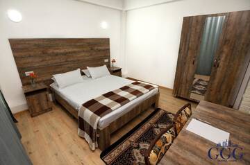 Фото номера Улучшенный двухместный номер с 1 кроватью Отель GG Group Hotel г. Алматы 3