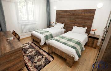 Фото номера Улучшенный двухместный номер с 2 отдельными кроватями Отель GG Group Hotel г. Алматы 6