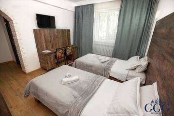 Фото номера Улучшенный двухместный номер с 2 отдельными кроватями Отель GG Group Hotel г. Алматы 7