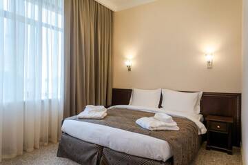 Фото номера Стандартный двухместный номер с 1 кроватью Отель Royal Plus Hotel г. Алматы 5
