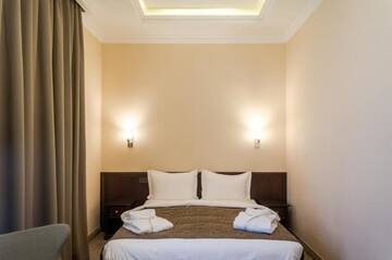 Фото номера Стандартный двухместный номер с 1 кроватью Отель Royal Plus Hotel г. Алматы 7