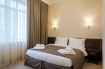 Фото номера Стандартный двухместный номер с 1 кроватью Отель Royal Plus Hotel г. Алматы 9