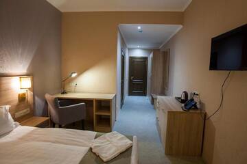 Фото номера Одноместный номер эконом-класса Отель Renion Park Hotel г. Алматы 7