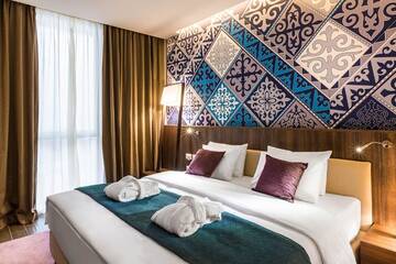 Фото номера Стандартный двухместный номер с 1 кроватью Отель Mercure Almaty City Center г. Алматы 9