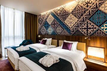Фото номера Стандартный двухместный номер с 2 отдельными кроватями Отель Mercure Almaty City Center г. Алматы 2