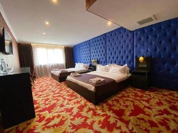 Фото номера Cемейный номер с собственной ванной комнатой Отель Grand Opera Hotel г. Алматы 7
