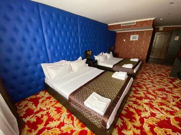 Фото номера Cемейный номер с собственной ванной комнатой Отель Grand Opera Hotel г. Алматы 11