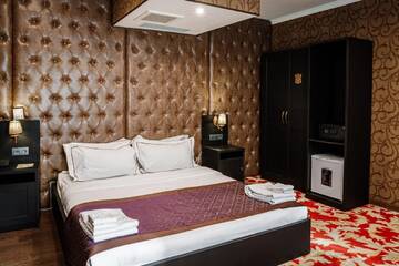 Фото номера Двухместный номер Делюкс с 1 кроватью Отель Grand Opera Hotel г. Алматы 5