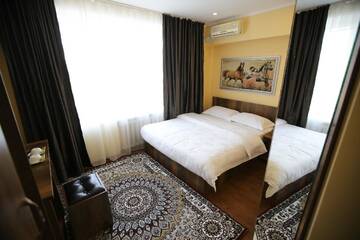 Фото номера Стандартный номер с кроватью размера &quot;king-size&quot; Отель Altai Business Hotel г. Алматы 9