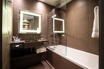 Фото номера Стандартный двухместный номер с 1 кроватью Отель Novotel Almaty City Center г. Алматы 5