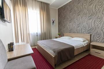 Фото номера Большой двухместный номер с 1 кроватью Отель Bastau Hotel г. Алматы 3
