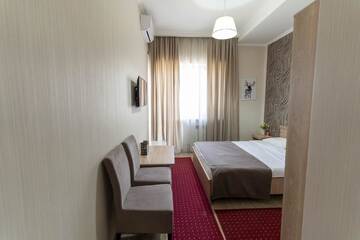 Фото номера Большой двухместный номер с 1 кроватью Отель Bastau Hotel г. Алматы 4