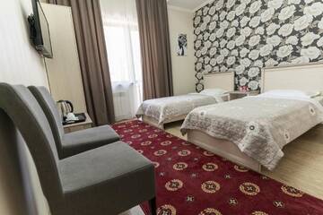 Фото номера Двухместный номер с 2 отдельными кроватями Отель Bastau Hotel г. Алматы 3