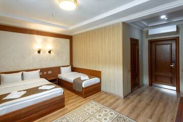 Фото номера Семейный номер Отель Sacvoyage Hotel г. Алматы 3