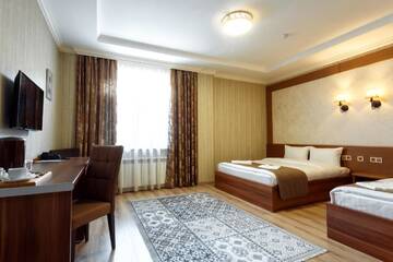 Фото номера Семейный номер Отель Sacvoyage Hotel г. Алматы 4