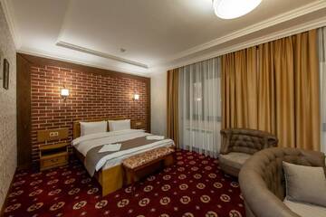 Фото номера Люкс с 1 спальней Отель Sacvoyage Hotel г. Алматы 2