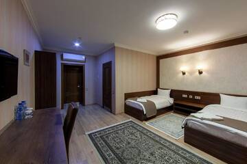 Фото номера Двухместный номер с 2 отдельными кроватями и душем Отель Sacvoyage Hotel г. Алматы 3