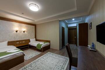 Фото номера Двухместный номер с 2 отдельными кроватями и душем Отель Sacvoyage Hotel г. Алматы 6