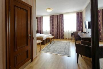 Фото номера Двухместный номер Делюкс с 1 кроватью Отель Sacvoyage Hotel г. Алматы 4