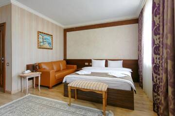 Фото номера Двухместный номер Делюкс с 1 кроватью Отель Sacvoyage Hotel г. Алматы 2