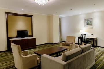 Фото номера Двухместный номер Делюкс с 1 кроватью Отель Shera Inn Hotel г. Алматы 8