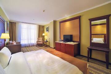 Фото номера Двухместный номер Делюкс с 1 кроватью Отель Shera Inn Hotel г. Алматы 6