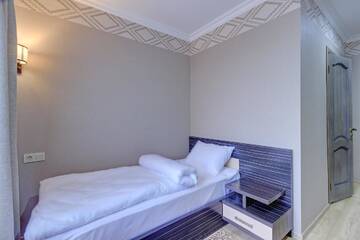 Фото номера Стандартный одноместный номер Отель Resident Hotel Almaty г. Алматы 2