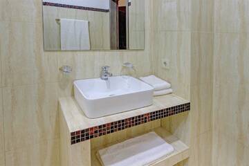 Фото номера Стандартный одноместный номер Отель Resident Hotel Almaty г. Алматы 5