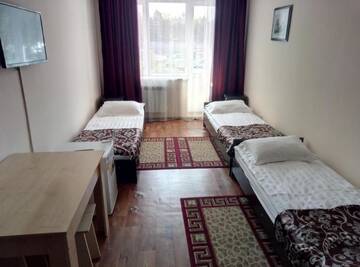 Фото номера Трехместный номер с общей ванной комнатой Мини-отель Academic Apartments г. Алматы 8