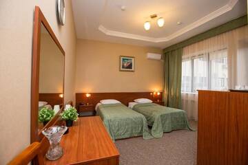 Фото номера Двухместный номер с 2 отдельными кроватями Отель Hotel Saya г. Алматы 6