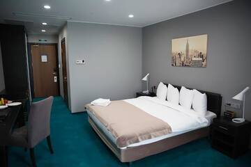Фото номера Стандартный двухместный номер с 1 кроватью Отель Maqan Hotel Almaty г. Алматы 10