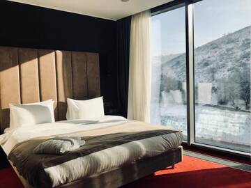 Фото номера Стандартный двухместный номер с 1 кроватью Отель Maqan Hotel Almaty г. Алматы 11