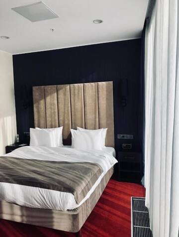 Фото номера Стандартный двухместный номер с 1 кроватью Отель Maqan Hotel Almaty г. Алматы 4