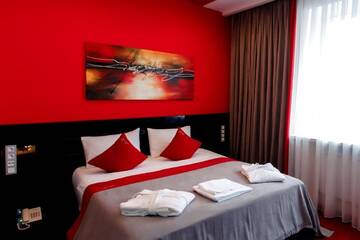 Фото номера Улучшенный двухместный номер с 1 кроватью Отель Mildom Premium Hotel г. Алматы 4