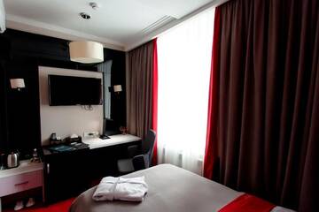 Фото номера Улучшенный одноместный номер Отель Mildom Premium Hotel г. Алматы 5