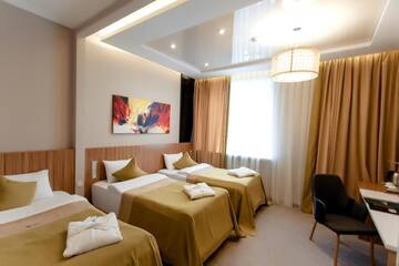 Фото номера Улучшенный семейный номер Отель Mildom Premium Hotel г. Алматы 5