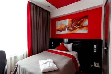 Фото номера Улучшенный одноместный номер Отель Mildom Premium Hotel г. Алматы 6