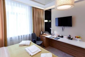 Фото номера Улучшенный семейный номер Отель Mildom Premium Hotel г. Алматы 7