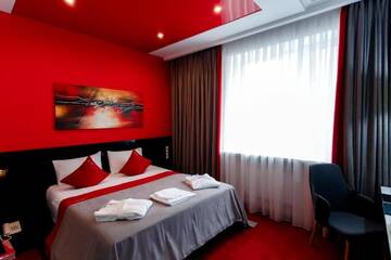 Фото номера Улучшенный двухместный номер с 1 кроватью Отель Mildom Premium Hotel г. Алматы 7
