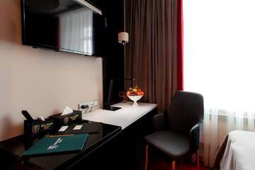 Фото номера Улучшенный двухместный номер с 1 кроватью Отель Mildom Premium Hotel г. Алматы 8